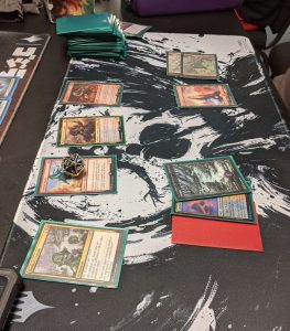 Assortment of Magic Cards on Mat